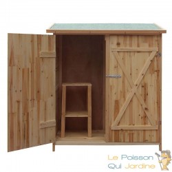 Grande cabane de jardin en bois pour le rangement des outils et le stockage des objets de jardin.