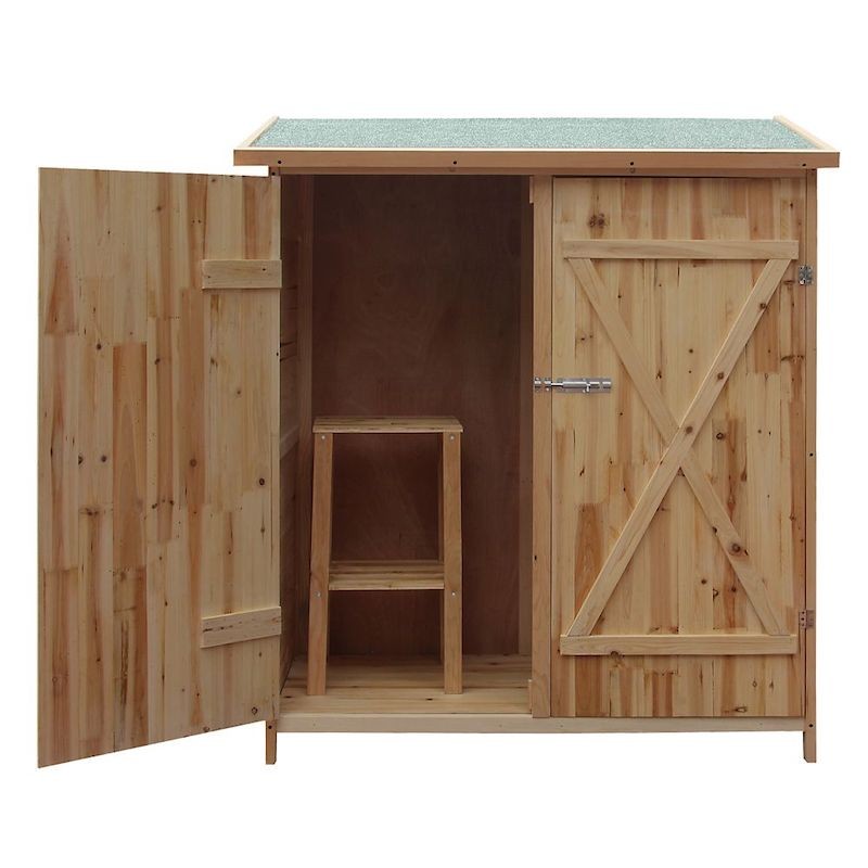 Grande cabane de jardin en bois pour le rangement des outils et le stockage des objets de jardin.
