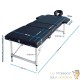 Table de massage pliable en aluminium noir avec réglage de hauteur et accoudoirs.