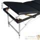 Table de massage pliable en aluminium noir avec réglage de hauteur et accoudoirs.