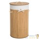 Panier à linge rond en bambou : Pratique et écologique pour une buanderie organisée.