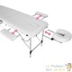 Table de massage pliable en aluminium blanc avec réglage de hauteur et accoudoirs.