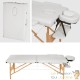 Table de massage blanche pliable en bois avec réglage de hauteur et accoudoirs.