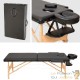 Table de massage noire pliable en bois avec réglage de hauteur et accoudoirs.