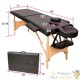Table de massage noire pliable en bois avec réglage de hauteur et accoudoirs.